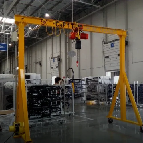 Grúa gantry móvil amarilla con polipasto eléctrico